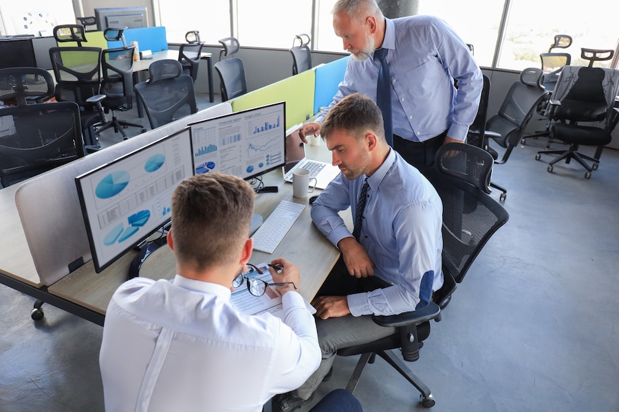 Team discussing seamless legacy application transition